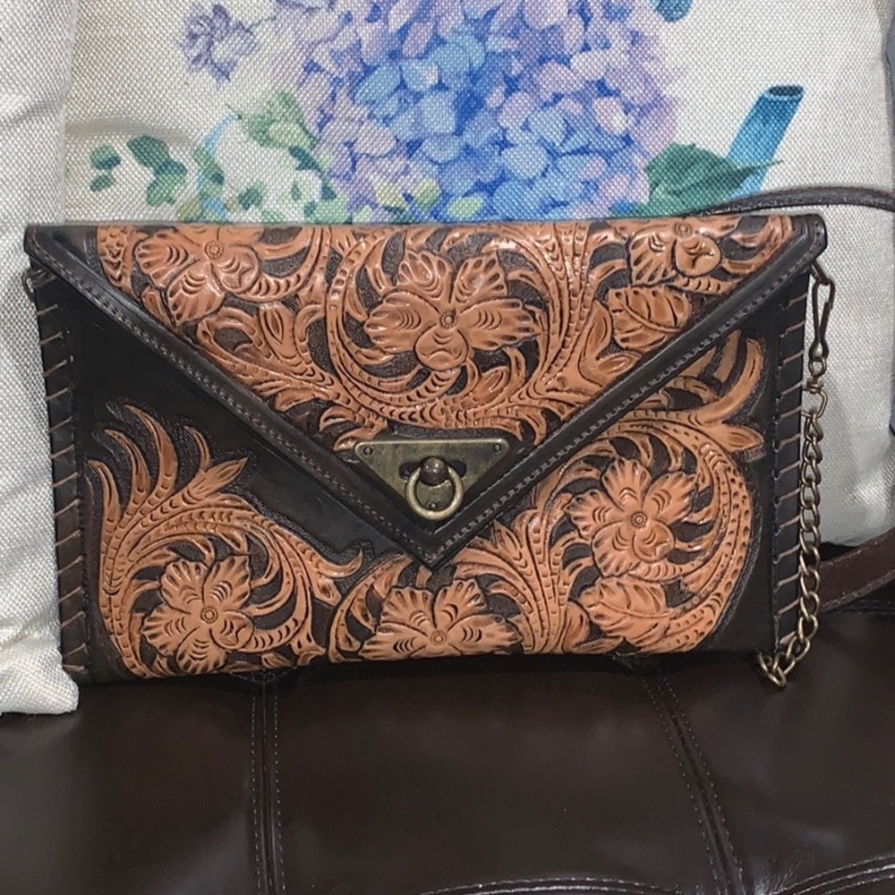 Handmade tooled crossbody clutch